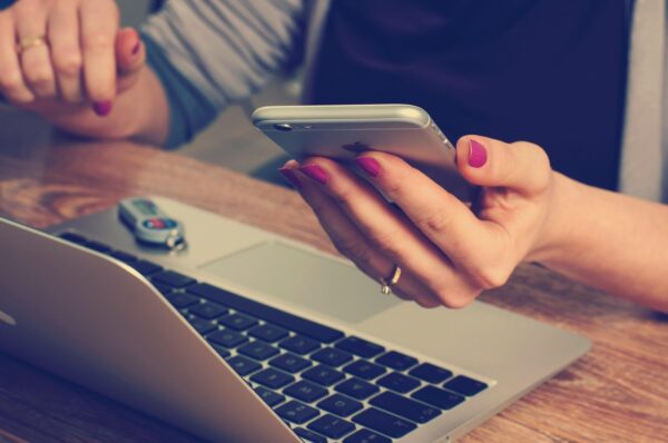 Using software on a laptop and phone
